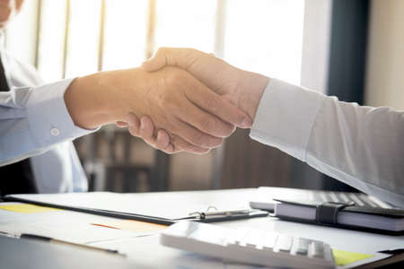 Business partnership meeting concept. Image businessmans handshake. Successful businessmen handshaking after good deal.の写真素材