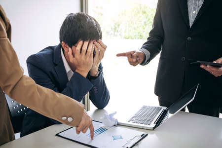 Business people conflict problem working in team turns into fight.の写真素材