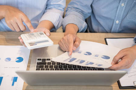 Business team two executive colleagues discussing and analysis working Financial investment on...