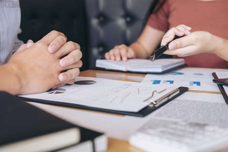 Business team meeting working with new startup project, discussion and analysis data the charts and...