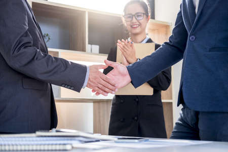 Finishing up a meeting, Business handshake after discussing good deal of Trading contract for both companies and gesturing people connection dealの写真素材