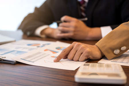Business team meeting working with new startup project, discussion and analysis data the charts and...