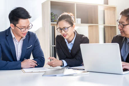 Teamwork togetherness unity support, Business corporate people working discussing financial data in modern co working, Group of professional team.の写真素材