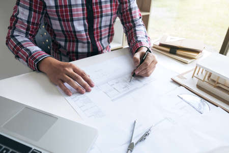 Architecture Engineer Drawing and working for architectural project and engineering tools on...