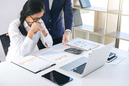 Partner meeting of business people colleagues consultation and discussion marketing plan meeting concept on financial report and analyzing investment project to development grow to success.の写真素材