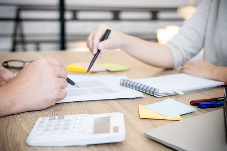 Young students campus or classmates with helps friend studying for a test an exam in workbook...