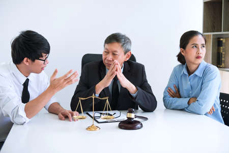 Unhappy divorce couple having conflict, Man and wife conversation during divorce process with senior...