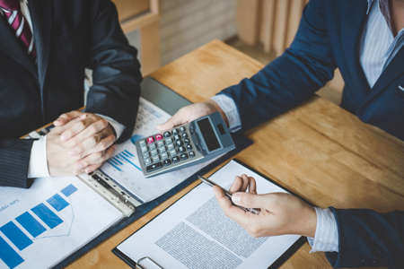 Teamwork process, Business team are presentation marketing plan strategy report analyzing financial...