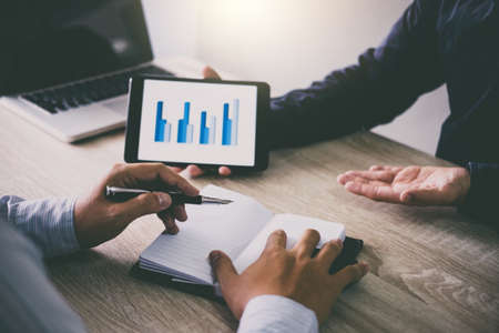 Two business executive conference presentation report of new plan marketing to development...