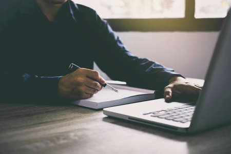 Professional at work, businessman working on laptop for new project of business strategy in...