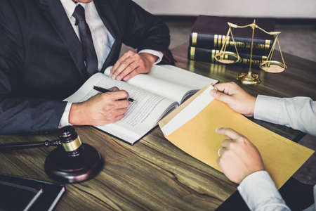 Businessman and Male lawyer or judge consult having team meeting with client, Law and Legal services...