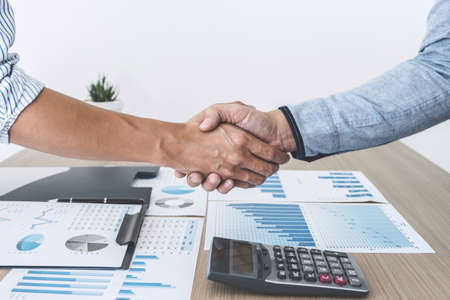 Business shaking hands after discussing good deal of Trading to sign agreement and become a partner, contract for both companies, Successful business partnership handshake.の写真素材