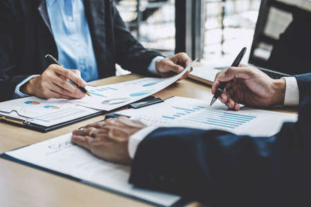 Finance manager meeting discussing company growth project success financial statistics, professional...
