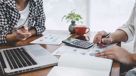 Business casual team meeting working with new startup project, discussion and analysis data the...