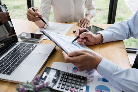 Two business team manager having a discussing with new project success financial statistics, Partner meeting professional investor working start up project for both company with document.の写真素材