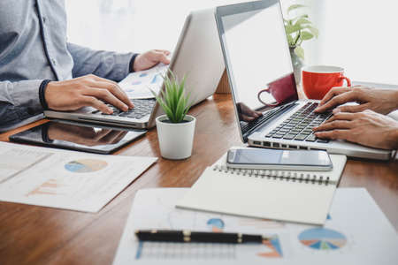 Business casual team meeting working with new startup project, discussion and analysis data the...
