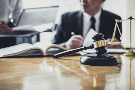 Male lawyer or Counselor working in courtroom have meeting with client are consultation with...