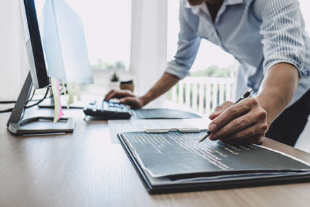 Professional programmer working at developing programming and website working in a software develop...