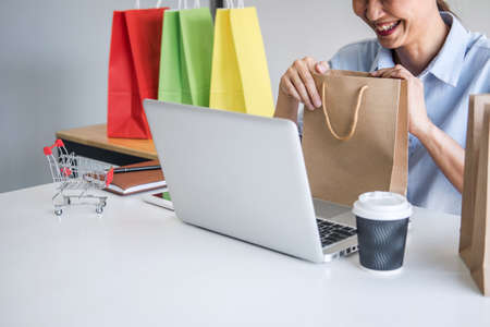 Woman using credit card register security code and payments online shopping and customer service network connection market, using on laptop, Internet Online shopping or internet banking concept.の写真素材