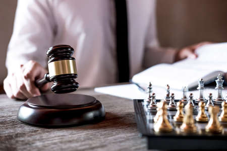 Legal law, advice and justice concept, Professional male lawyers working on courtroom sitting at the...