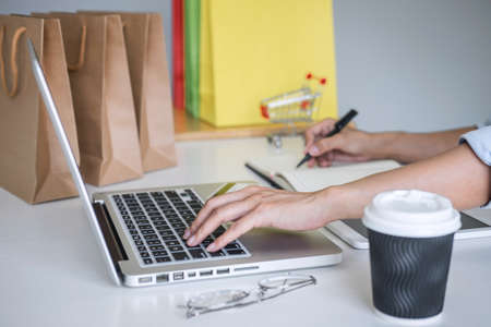 Woman using credit card register security code payments online shopping and customer service network connection market, using technology on laptop, Internet Online shopping or banking concept.の写真素材