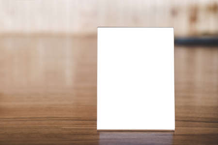 Mock up acrylic frame posters pattern template forms background, blank menu frame on table in coffee...