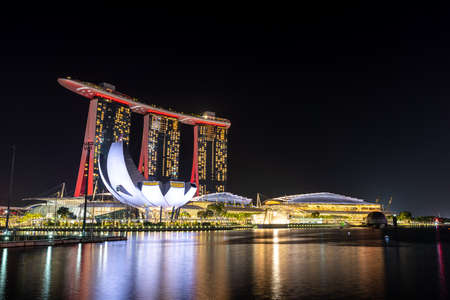 Singapore, Singapore - Aug 3, 2019 : View at Singapore Marina Bay Sand Casino Hotel and Art Science museum in cityscape landmarks.のeditorial素材