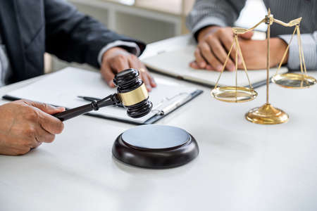 Consultation and conference of Male lawyers and professional businessman working and discussion...