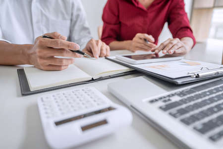 Teamwork of business casual colleagues, consultation new strategy plan business and market growth on...