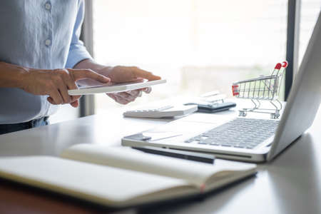 Woman using credit card register security code and payments online shopping and customer service...