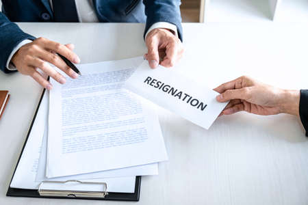 Image of business woman hand sending a resignation letter to executive boss, Change of job,...