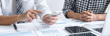 Teamwork of business casual colleagues, consultation new strategy plan business and market growth on...