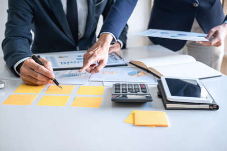 Business team meeting to conference, collaboration discussing working analyzing with financial data and marketing business strategy project, presentation and brainstorming to making profit of companyの写真素材