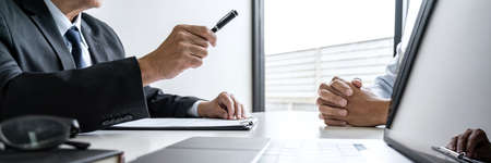 Job interview, Senior selection committee manager asking questions to applicant about work history,...