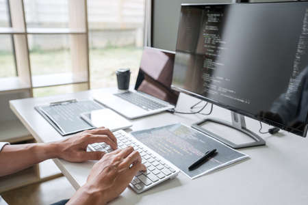Young Professional programmer working at developing programming and website working in a software...