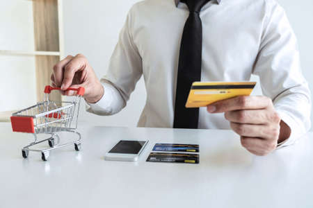 Man using credit card register security code payments online shopping and customer service network...