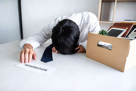 Feeling sick and tired, businessman frustrated and stress to resignation.の写真素材