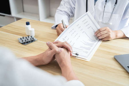 Doctor working of diagnosis and recommend something a method with patient treatment, after results about the problem illness of patient.の写真素材