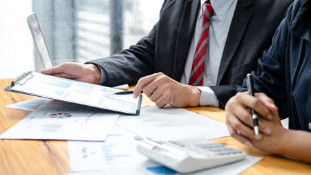Business team meeting to conference discussing working analyzing with financial data and marketing...