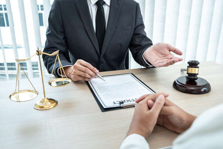 Male lawyer or notary working consulting and discussion to businesswoman client in the office, Law...