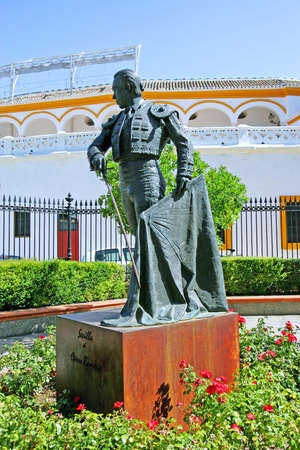 Bronze Statue of famous bullfighter outside large main bullring in Seville Andalucia Spainの写真素材