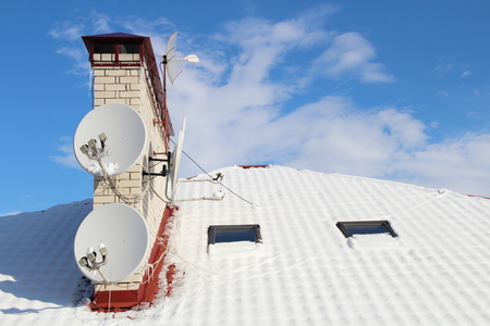 Snow on a roofの写真素材