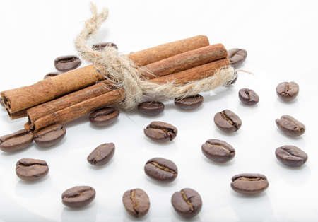 Roasted coffee beans and cinnamon