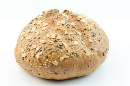 Bun with sesame seeds and oat flakes