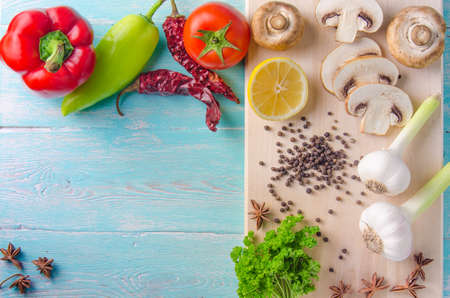 Vegetables and spices on the tableの写真素材