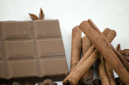 Tiles broken chocolate and coffee beansの写真素材