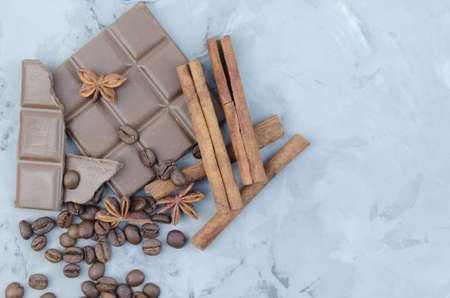 Tiles broken chocolate on a marble slabの写真素材