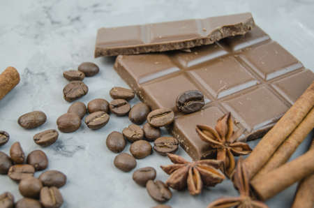 Tiles broken chocolate on a marble slabの写真素材