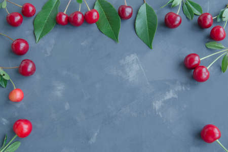 cherries on concreteの写真素材