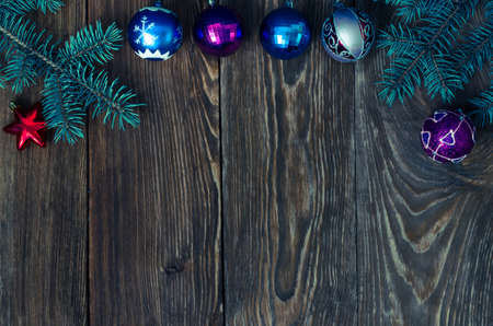 Branches of blue spruce and Christmas toys.の写真素材